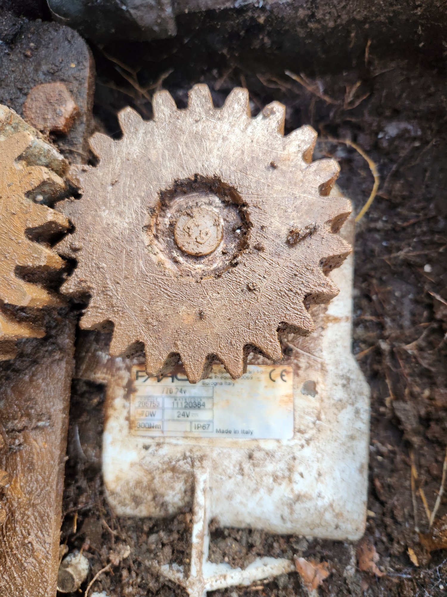 Corroded FAAC underground gate motor excavated for repair — common cause of gate failure in Surrey